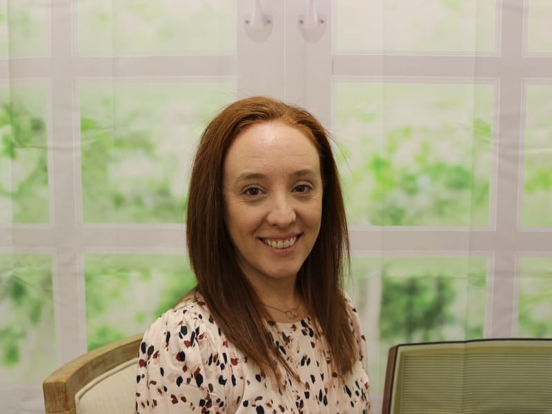 Professional headshot of Jess Collins